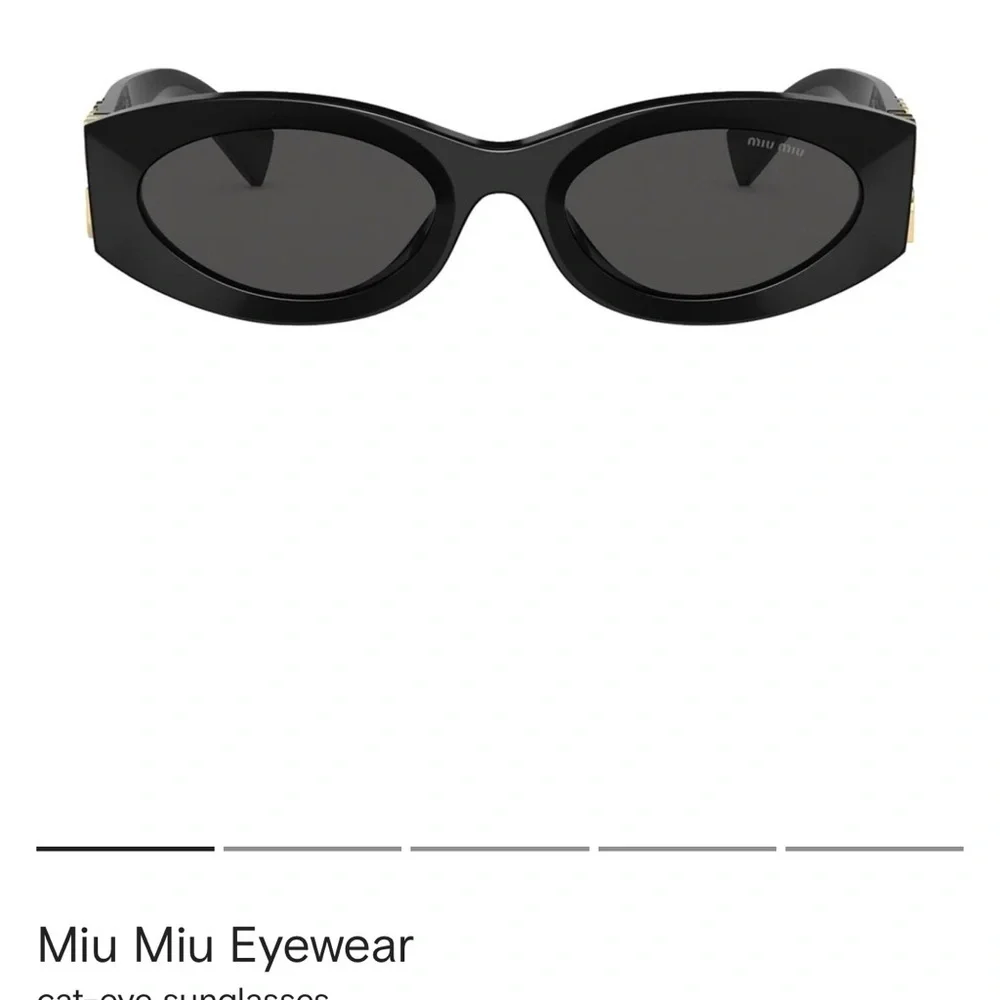 Miu Miu Black Oval Sunglasses